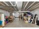 Unfinished basement for storage or future projects with exposed duct work and concrete floor at 12826 Lake Port St, Longmont, CO 80504