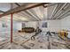 Partially finished basement providing space for home gym and a seating area at 12826 Lake Port St, Longmont, CO 80504