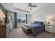 Spacious main bedroom with tray ceiling, soft carpet, lots of natural light, and nice furnishings at 12826 Lake Port St, Longmont, CO 80504