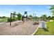 Community playground includes swings, climbing structure, and slide at 12826 Lake Port St, Longmont, CO 80504