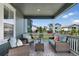 Comfortable porch with seating area, ideal for relaxing and enjoying the view at 12826 Lake Port St, Longmont, CO 80504