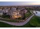 Aerial view of home on golf course with a pond and tree surround neighborhood at 4505 W 100Th Ave, Westminster, CO 80031