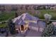 Aerial view of the multi-story home showcases lush landscaping and beautiful rooflines at 4505 W 100Th Ave, Westminster, CO 80031