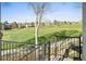Back deck with golf course view, complemented by well-maintained landscaping at 4505 W 100Th Ave, Westminster, CO 80031
