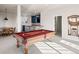 Basement area featuring a pool table, bar, and table with chairs, perfect for entertainment at 4505 W 100Th Ave, Westminster, CO 80031