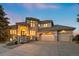 Stunning two-story home with stone accents, tile roof, and a three-car garage at 4505 W 100Th Ave, Westminster, CO 80031