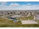 Extensive community park featuring a playground, swimming pool, basketball court, and recreational areas at 25064 E Archer Pl, Aurora, CO 80018
