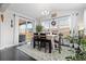 A dining room with a sliding glass door and a view of the backyard at 25064 E Archer Pl, Aurora, CO 80018