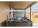 Outdoor hot tub on a patio, perfect for relaxing and entertaining at 25064 E Archer Pl, Aurora, CO 80018