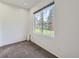 Bedroom has a large window to allow natural light to flood the space at 6827 S Webster St # E, Littleton, CO 80128