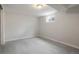Finished basement bedroom features window and carpet at 6698 S Wellington Ct, Centennial, CO 80121