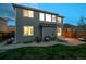 A spacious backyard with an extended patio area and lush green lawn for outdoor enjoyment at 16829 Trail View Cir, Parker, CO 80134