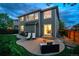 A spacious backyard with an extended patio area and lush green lawn for outdoor enjoyment at 16829 Trail View Cir, Parker, CO 80134