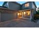 Charming two-story home with a covered porch, attached garage, and well-manicured lawn at 16829 Trail View Cir, Parker, CO 80134