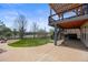 The backyard features a deck, patio, and lawn, with a hot tub area for relaxation and enjoyment at 6994 S Fultondale Cir, Aurora, CO 80016