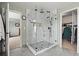 Contemporary walk-in shower boasting a modern design with sleek fixtures and tile at 6994 S Fultondale Cir, Aurora, CO 80016