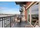 Charming balcony with wrought iron railing and seating to enjoy the cityscape at 1950 N Logan St # 905, Denver, CO 80203