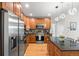 Kitchen featuring stainless steel appliances, granite countertops and a stylish island at 1950 N Logan St # 905, Denver, CO 80203