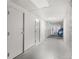 Hallway of storage units in a clean and secure storage area at 1950 N Logan St # 905, Denver, CO 80203