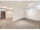 Finished basement with neutral carpet, recessed lighting, and ample space perfect for recreation or relaxation at 13853 W 66Th Pl, Arvada, CO 80004