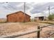 Property view featuring a barn and horse pasture area with fencing surrounding the property at 2312 Arabian Trl, Elizabeth, CO 80107