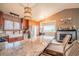 Spacious kitchen with stainless steel appliances, granite countertops, an island, and a fireplace at 2312 Arabian Trl, Elizabeth, CO 80107
