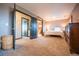 Spacious main bedroom with ensuite bathroom featuring neutral color palette and modern finishes at 2312 Arabian Trl, Elizabeth, CO 80107