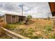 Property view featuring a shed and horse pasture area with fencing surrounding the property at 2312 Arabian Trl, Elizabeth, CO 80107