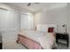 Cozy bedroom featuring a comfortable bed, closet and ample natural light at 4625 W 50Th Ave # 203, Denver, CO 80212
