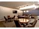 Community game room featuring a billiard table, lounge seating, and stylish lighting fixtures at 4625 W 50Th Ave # 203, Denver, CO 80212