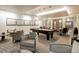 Relaxing game room featuring comfortable seating, a billiard table, and stylish lighting at 4625 W 50Th Ave # 203, Denver, CO 80212