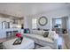 Open-concept living area with a seamless blend to the kitchen and a cozy, inviting atmosphere at 4625 W 50Th Ave # 203, Denver, CO 80212