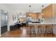 Modern kitchen with sleek cabinets, stainless steel appliances, and a breakfast bar with stylish seating at 2810 N Harrison St, Denver, CO 80205