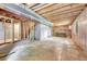 Unfinished basement with exposed rafters and beams, and stairs is ready for your design ideas at 302 Northridge Rd, Highlands Ranch, CO 80126