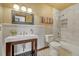 Bathroom with white subway tile, wainscotting, and modern fixtures at 302 Northridge Rd, Highlands Ranch, CO 80126