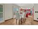 Dining area with hardwood floors located off of the kitchen at 302 Northridge Rd, Highlands Ranch, CO 80126