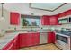 This well-appointed kitchen features stainless appliances, granite counters, and a garden window at 302 Northridge Rd, Highlands Ranch, CO 80126