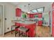 Eat-in kitchen with breakfast bar, granite countertop, and stainless steel appliances at 302 Northridge Rd, Highlands Ranch, CO 80126
