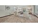Bright living room with a neutral color scheme, carpet floors, and comfortable seating arrangement at 302 Northridge Rd, Highlands Ranch, CO 80126