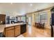 Open-concept kitchen area with breakfast nook and access to the living room, perfect for entertaining and casual dining at 9001 W Chatfield Dr, Littleton, CO 80128