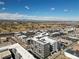 This aerial view captures this neighborhood, showcasing its vibrant community and city views at 1898 S Bannock St # 404, Denver, CO 80223
