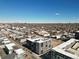 Modern apartment buildings in an urban area with city skyline views on a clear day at 1898 S Bannock St # 404, Denver, CO 80223