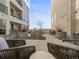 Beautiful community courtyard with comfortable lounge seating and manicured landscaping at 1898 S Bannock St # 404, Denver, CO 80223