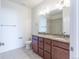 The bathroom features a granite double vanity at 4605 Copeland Loop # 103, Highlands Ranch, CO 80126