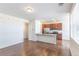 Spacious kitchen with stainless appliances, granite counters and wood flooring at 4605 Copeland Loop # 103, Highlands Ranch, CO 80126