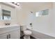 Bright bathroom with a modern vanity, updated fixtures, and a shower-tub combination at 9526 Pinebrook St, Highlands Ranch, CO 80130