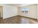 Cozy bedroom with laminate flooring and natural light at 2231 Crosswind St, Fort Lupton, CO 80621