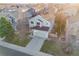 Aerial view of a charming house surrounded by lush greenery and neighboring homes at 11223 Jansen St, Parker, CO 80134