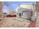 Home's backyard featuring a patio and partially fenced yard at 11223 Jansen St, Parker, CO 80134