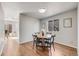 Bright dining area featuring a round table, modern chairs, and natural light from the window at 11223 Jansen St, Parker, CO 80134